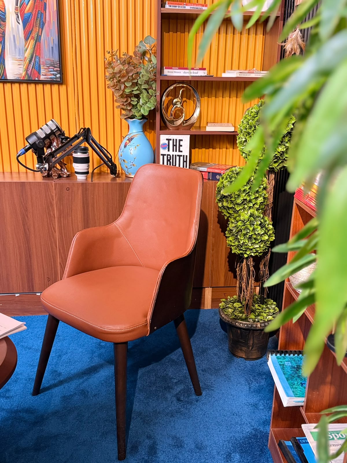 The CASA NEXUS podcast studio in Nairobi CBD, set up with microphone and seating for recording.